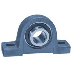 A close up of a pillow block bearing on a white background.