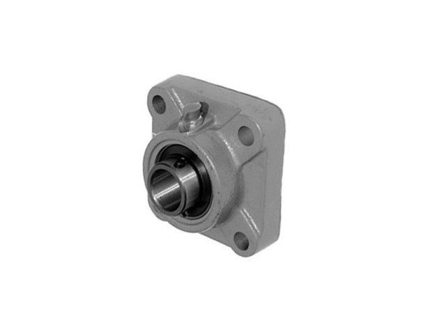 A close up of a pillow block bearing on a white background.