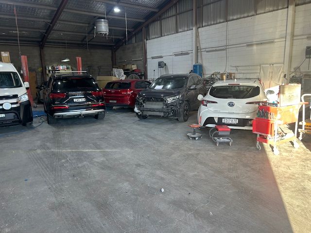 Cars in a Repair Shop — T & C Smash Repairs In Coffs Harbour, NSW