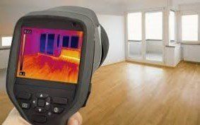residential electrician performing thermal imaging diagnosis