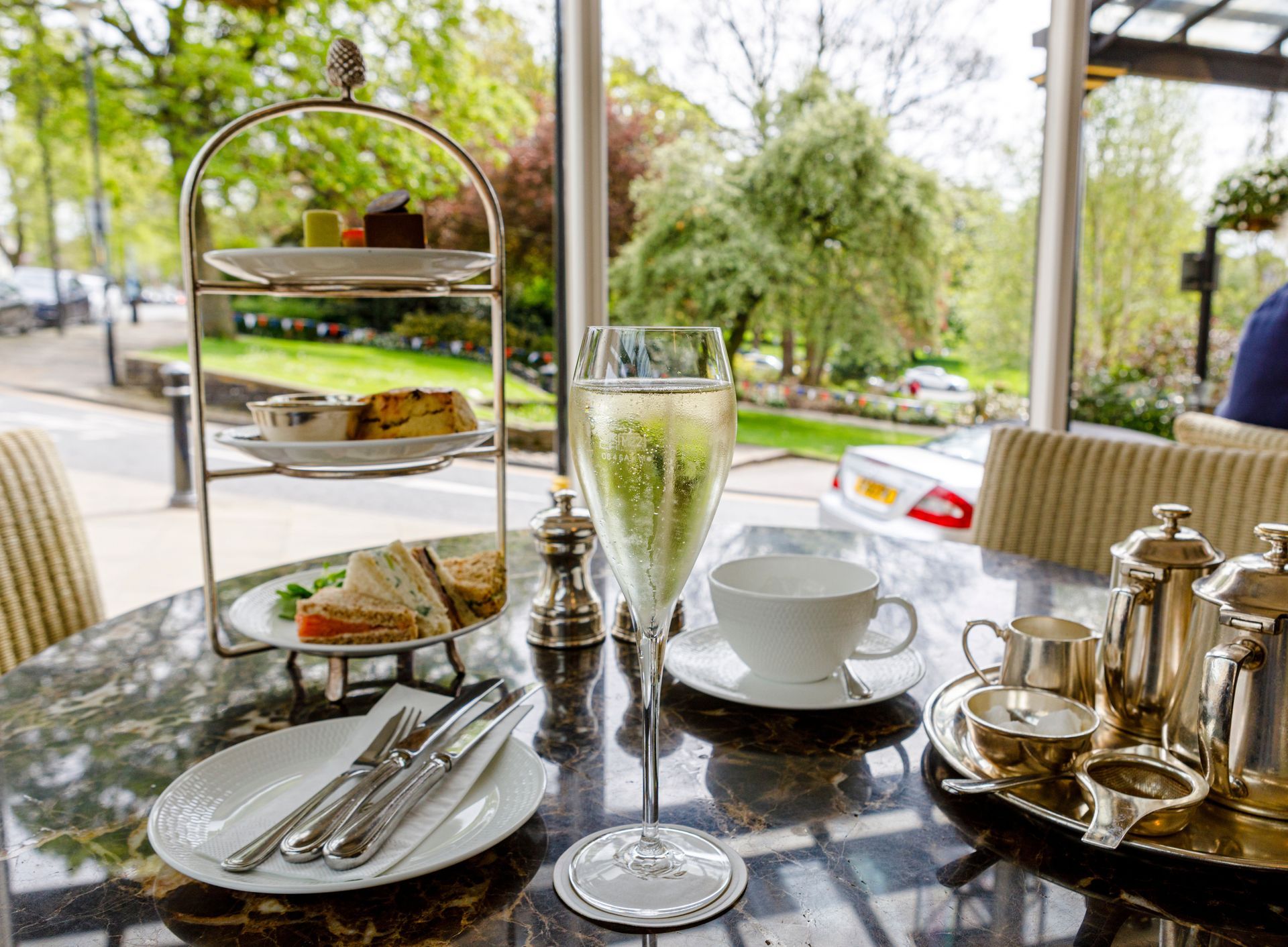 Cream tea party with drinks and outdoor setting for a relaxed celebration
