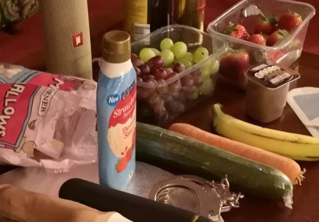Table displaying a selection of performance props and everyday items used during confidence and stage skills training sessions.