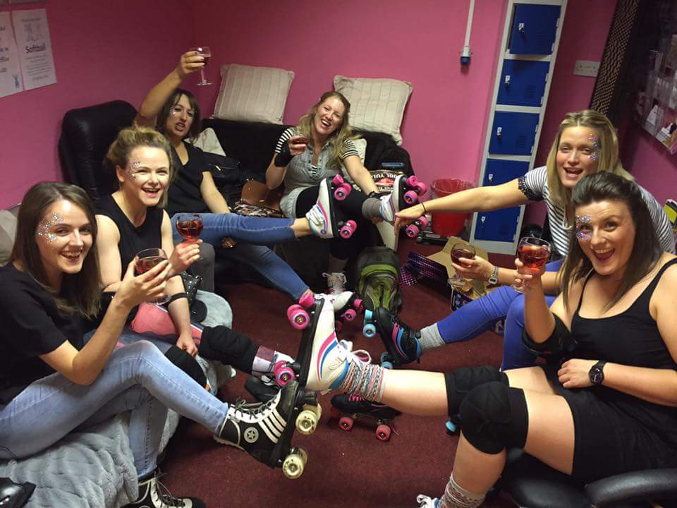 Friends enjoying a relaxed and social roller disco experience in Cardiff