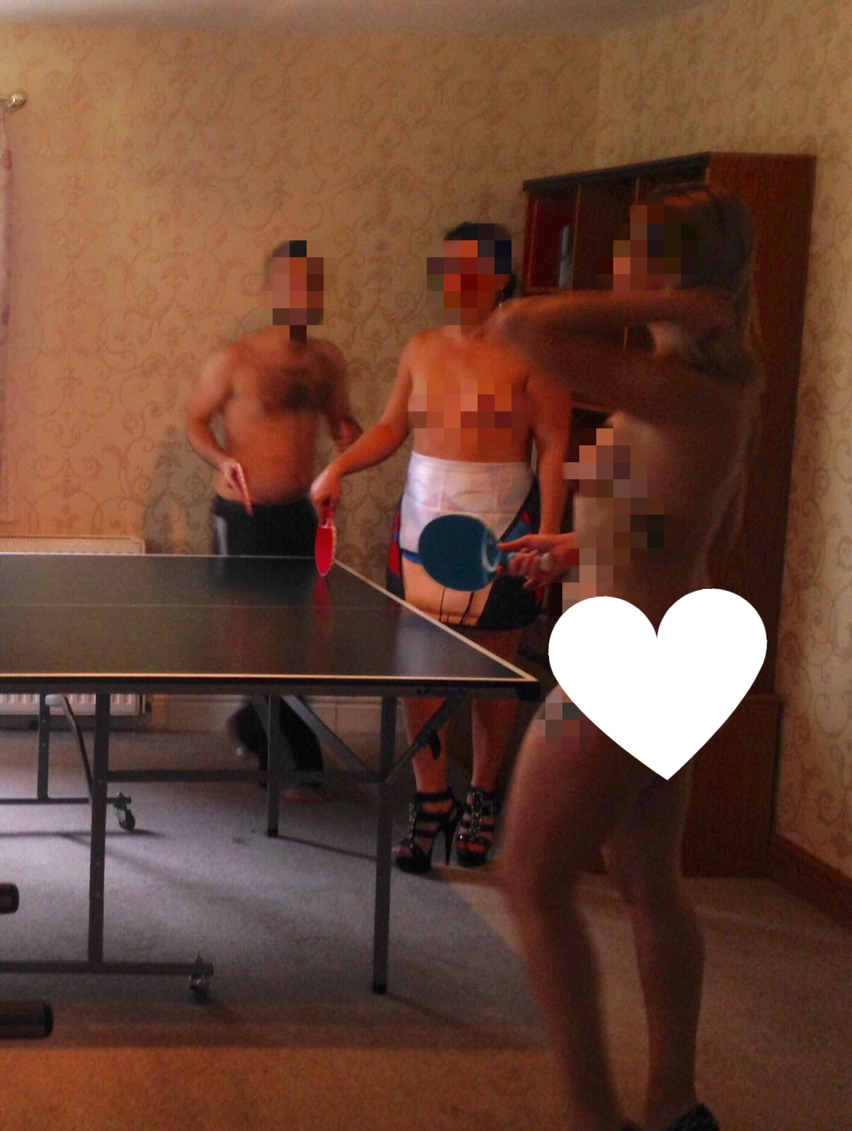 Nude hostesses playing ping pong at a stag party