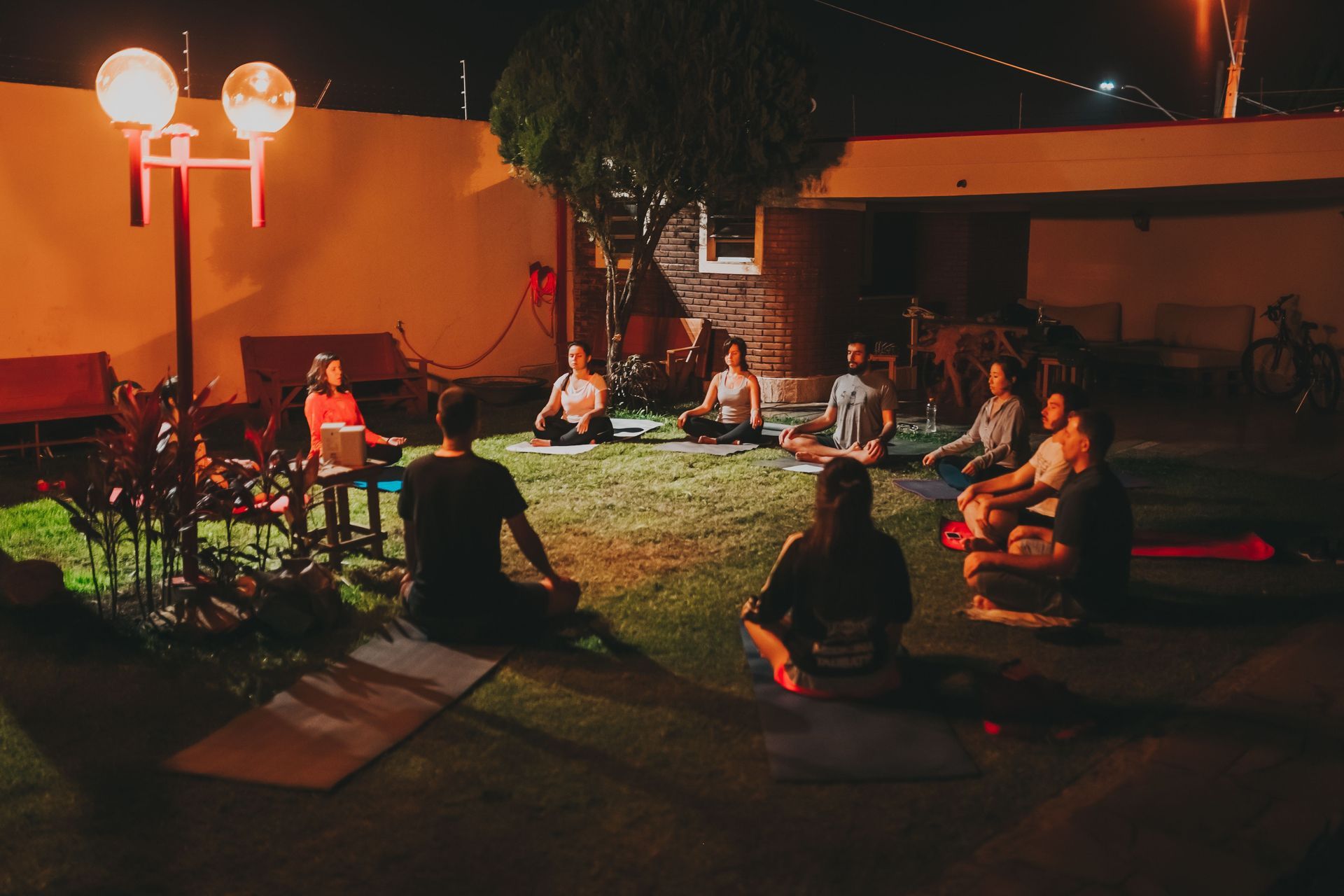 Healthy wellness parties enjoying yoga outdoors with friends during a sober celebration in the UK