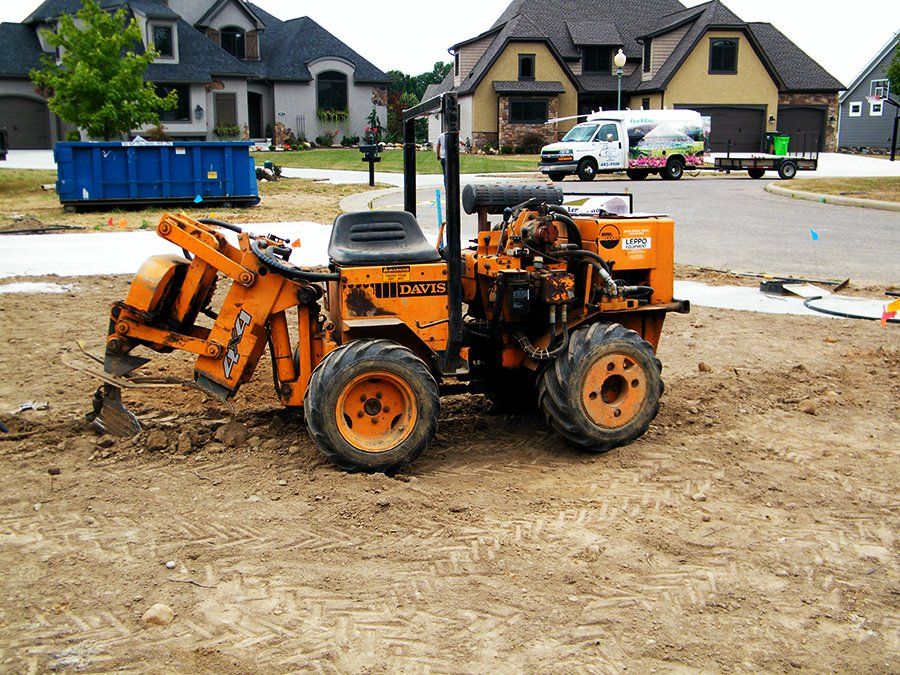 Ground Digging Machine - Canton, OH - Warstler Bros Landscaping