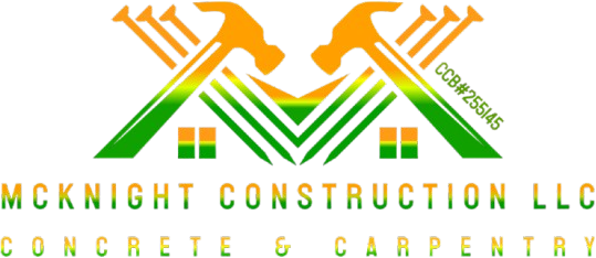 Logo for McKnight Construction LLC, featuring hammers, nails, and a house outline in green and orange.