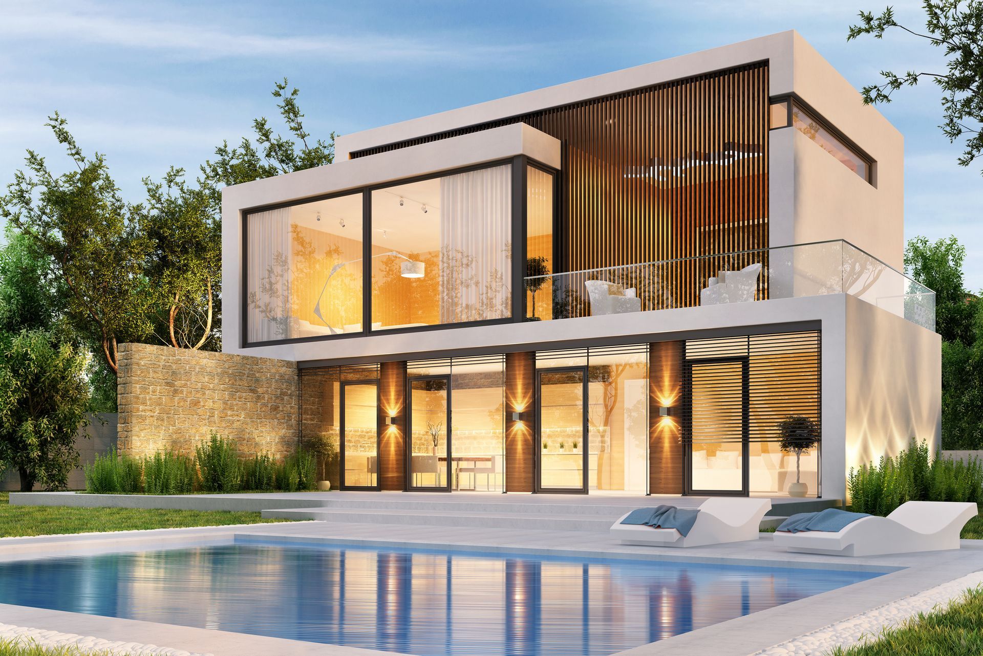 A modern house with a large swimming pool in front of it.