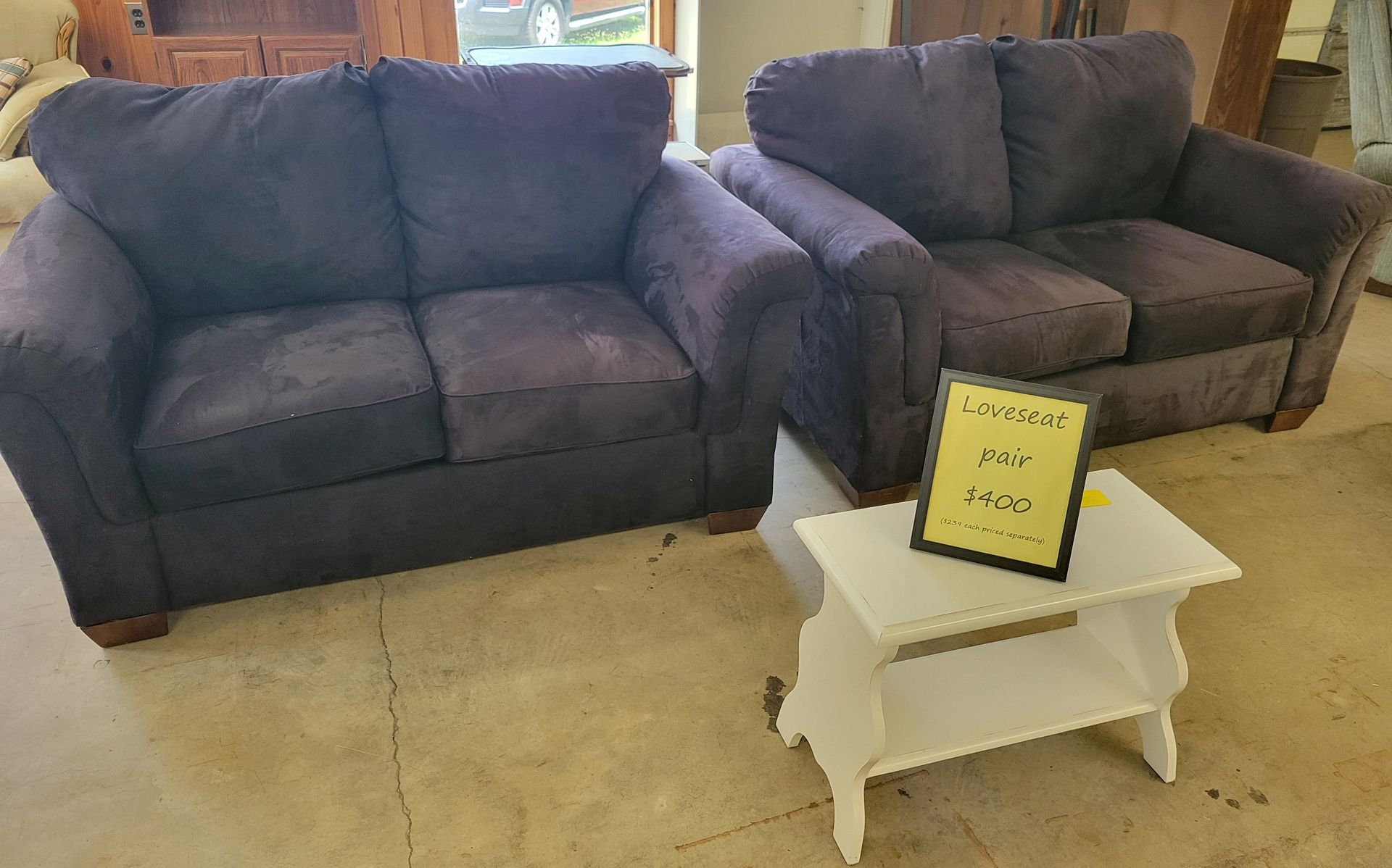 A couch and chair are sitting next to a coffee table - Mountain Home, AR - Chuck's Outlet & Moving Inc