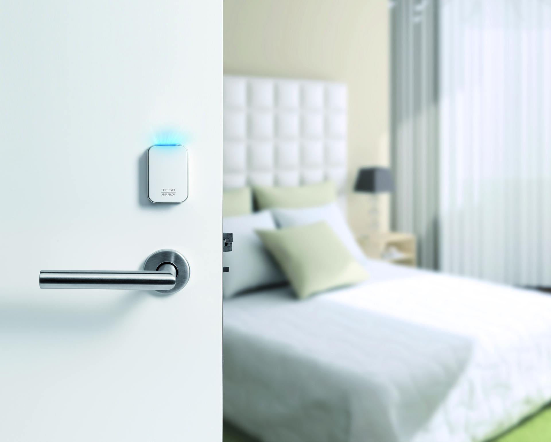 Locktel-installed TESA ASSA ABLOY electronic lock with RFID reader for modern hotel room keyless entry