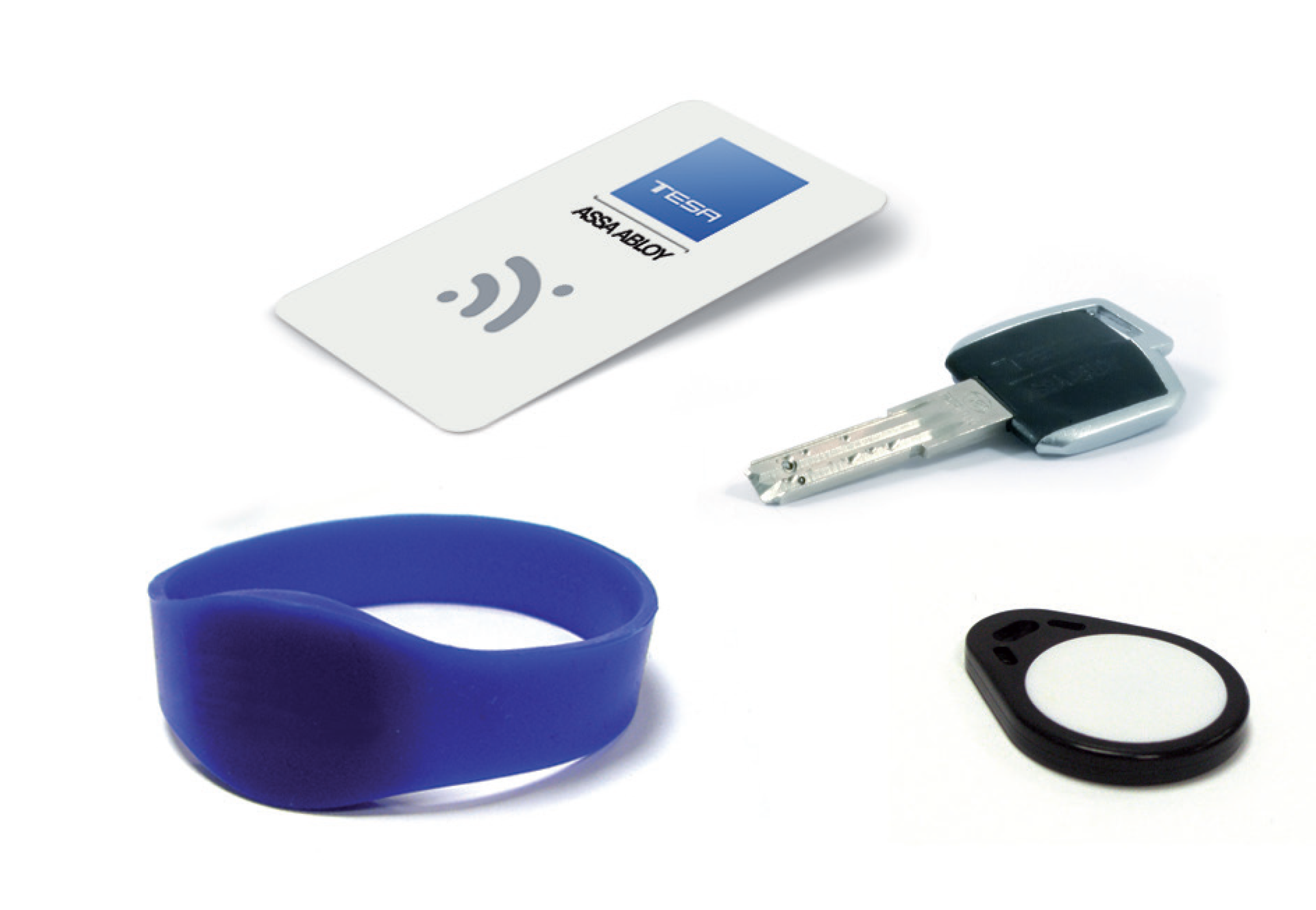 TESA ASSA ABLOY access credentials including RFID card, smart key, silicone wristband, and key fob for hotel and building security systems