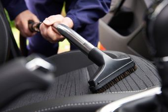 Interior car upholstery being cleaned