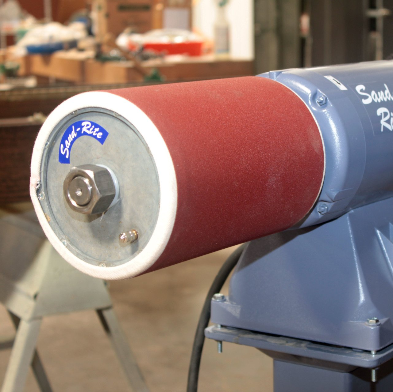 Sand-Rite J-Weight sanding sleeves for pneumatic pump drum sanders.