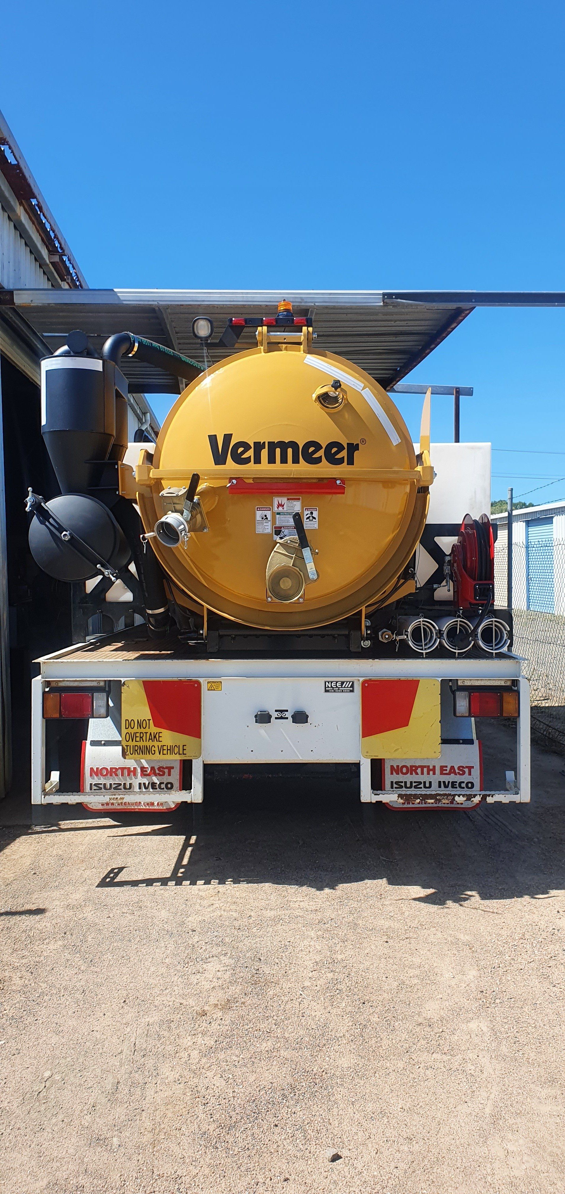 Rear of a Vacuum Excavator Truck — Providing Communications and Hydro Excavation Services in Townsville, QLD
