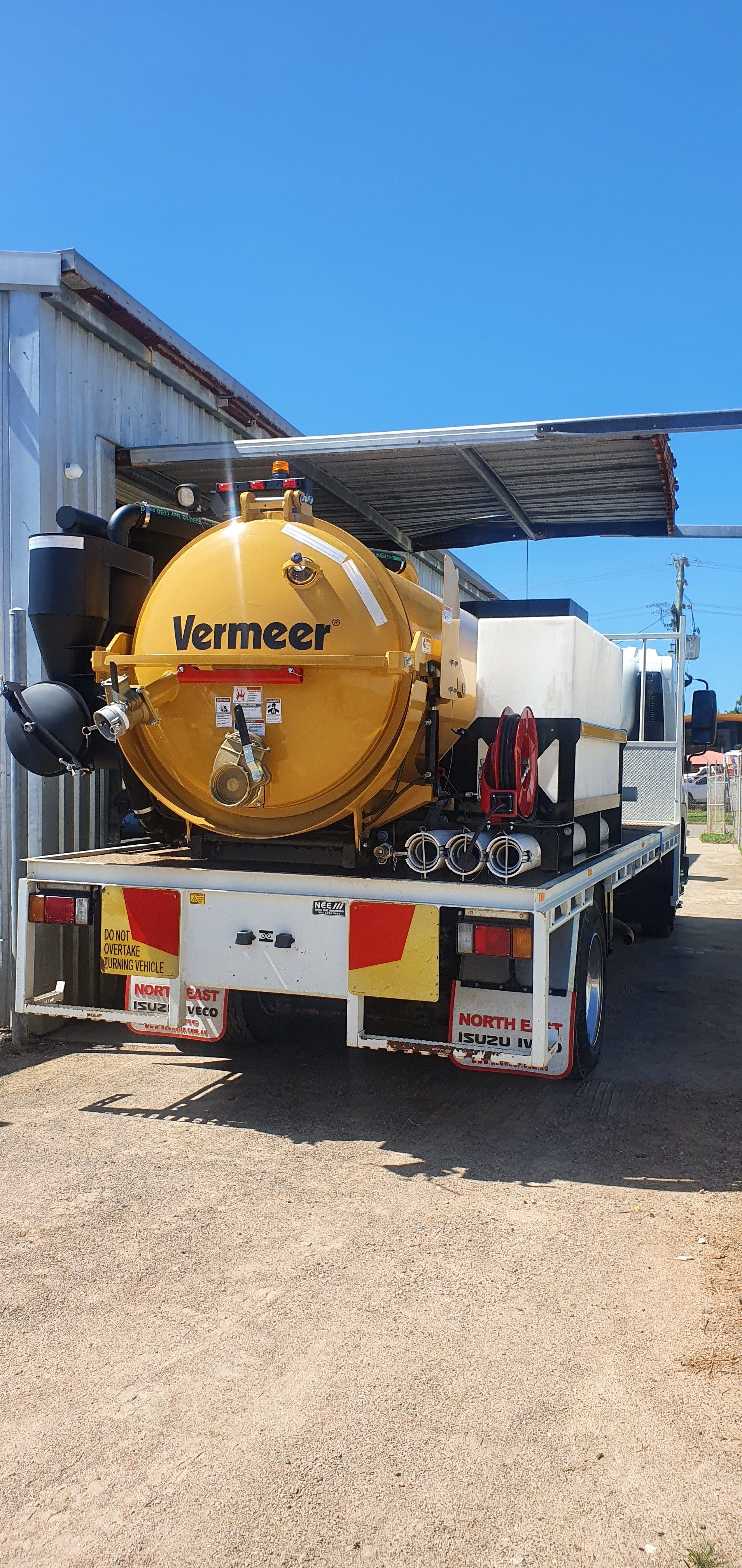 Vacuum Excavator Truck Parked — Providing Communications and Hydro Excavation Services in Townsville, QLD
