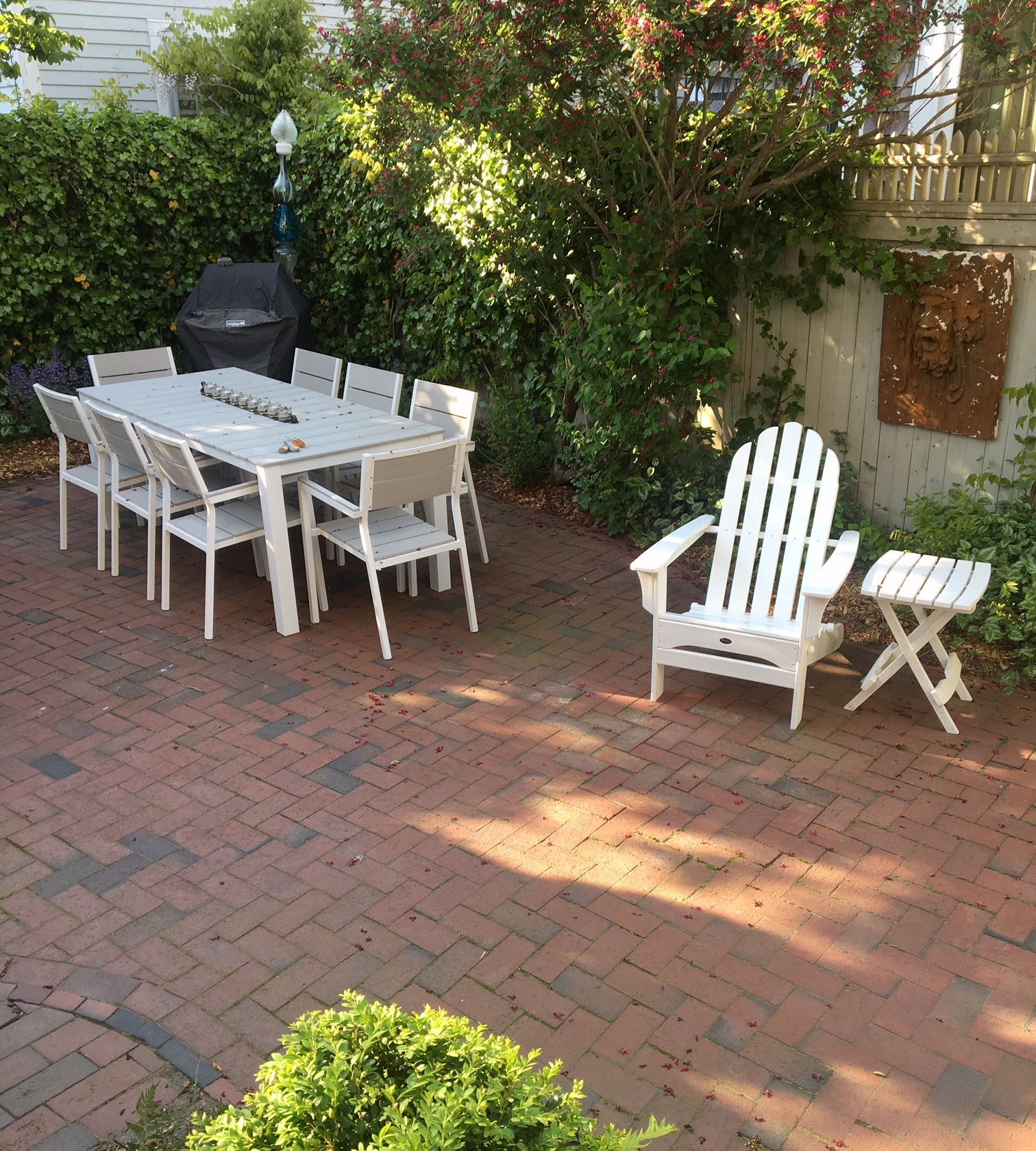 There is a table and chairs on the patio.