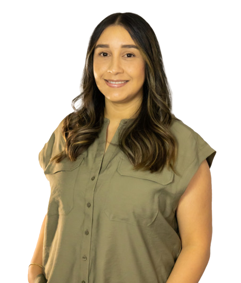 A person with long brown hair, smiling, wearing an olive green collared, sleeveless button-down shirt.