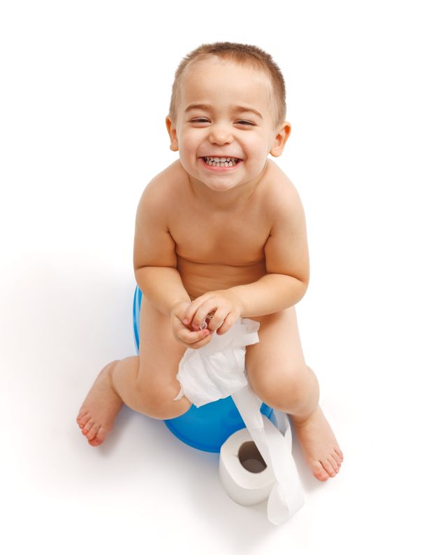 Kid laughing while sitting on a potty chair