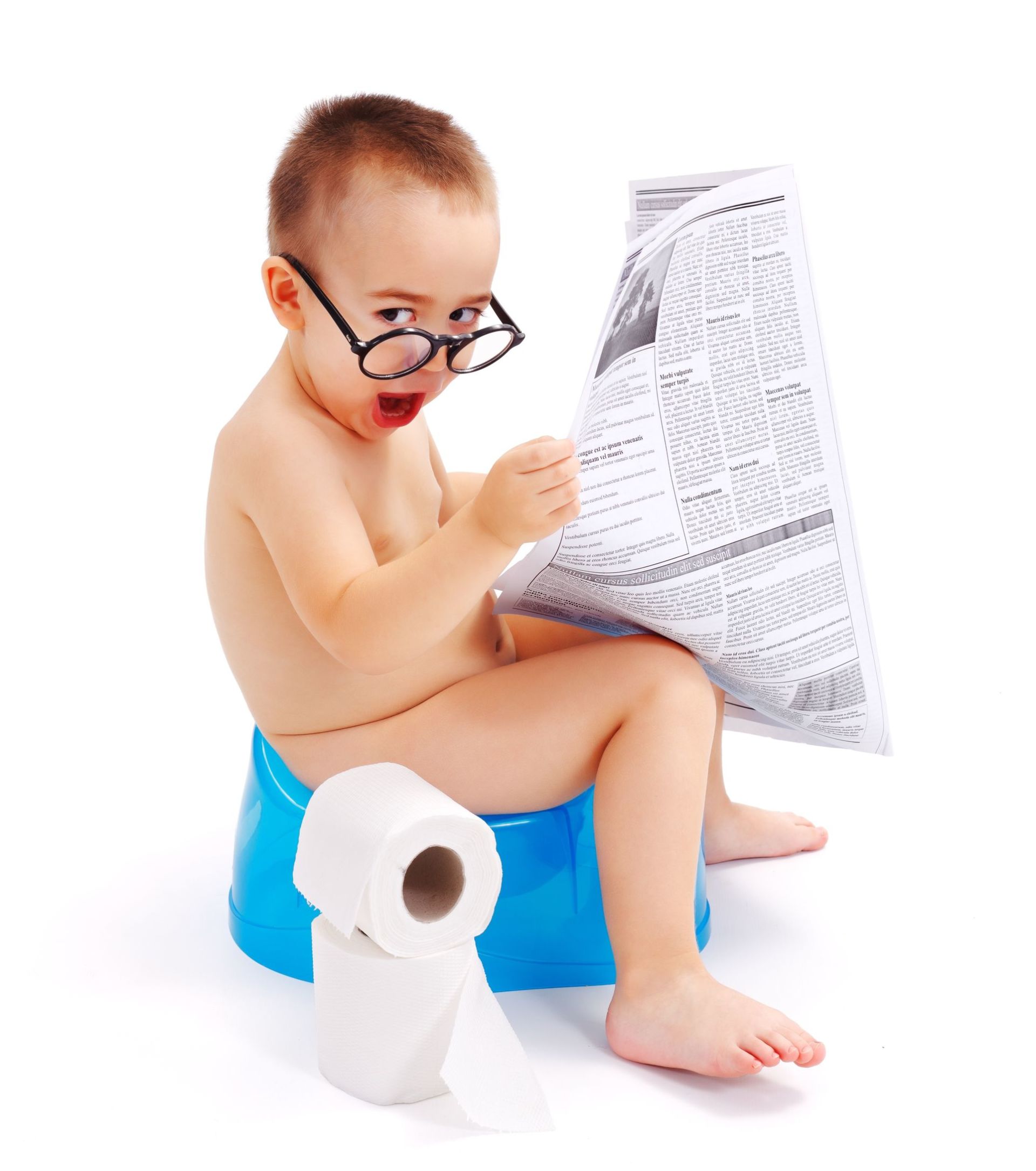 Little boy reading a newspaper on a potty chair
