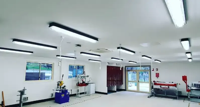 A Large Room With a Lot of Lights Hanging From the Ceiling — Stuart Pearce Electrical In Coffs Harbour, NSW