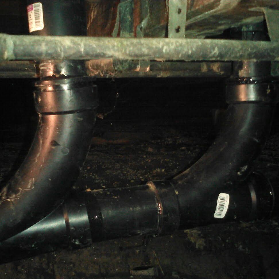 A couple of black pipes with the number 3 on them