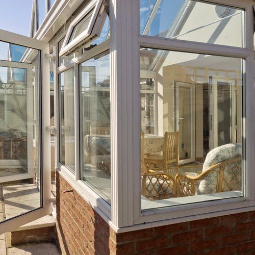 View through the window of a bright conservatory on a sunny day