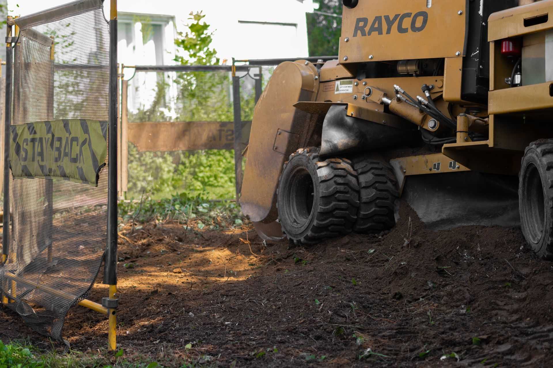 state college groundskeeper rakes, mobile incinerators and mud mats for construction