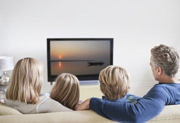 family watching television