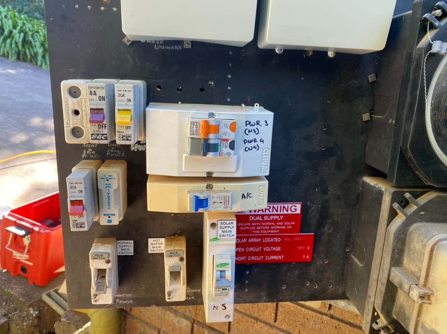 Electrical Panel With Circuit Breakers and Fuses — SparkSafe Electrical in Gerringong, NSW