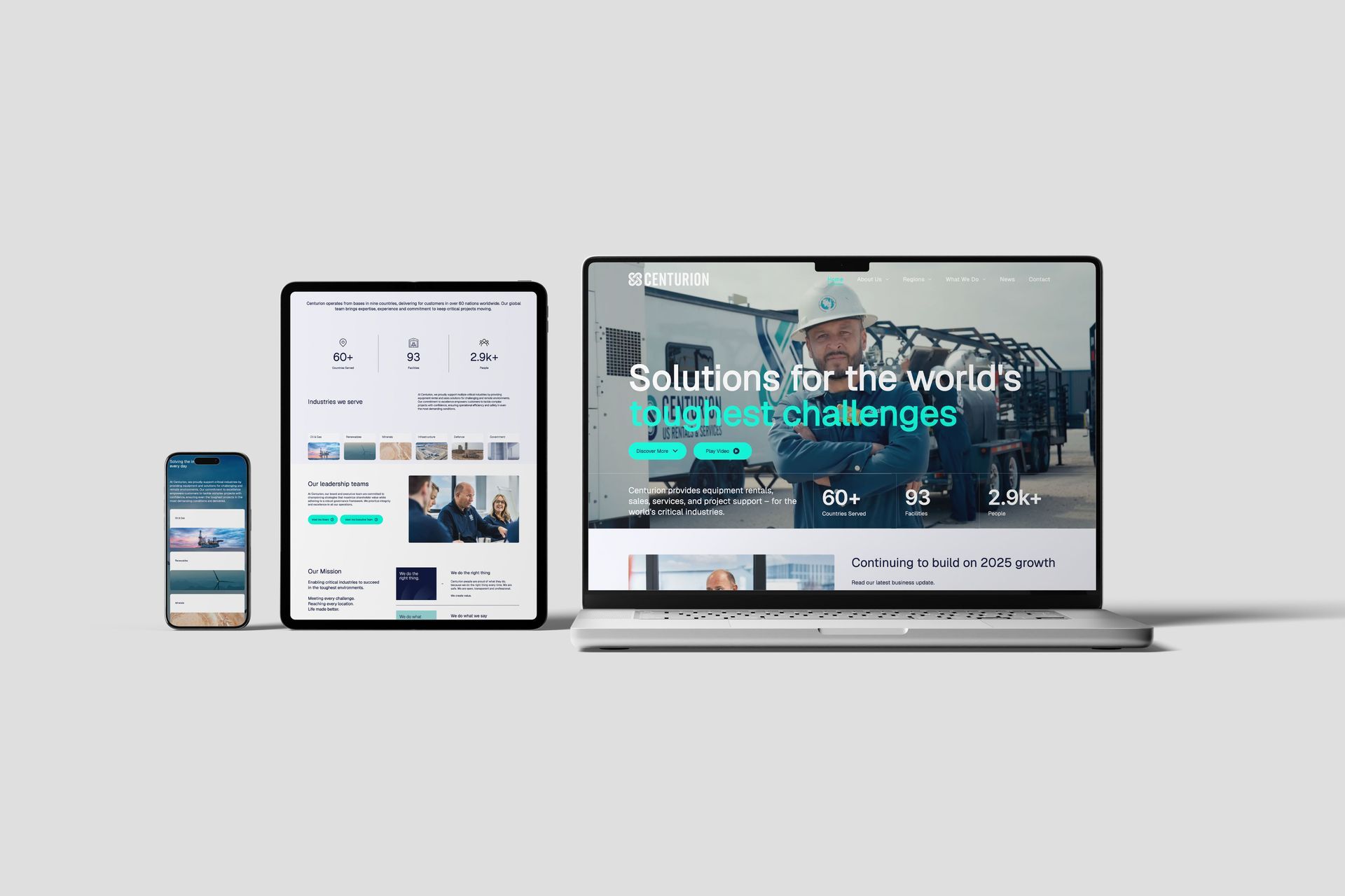 Smartphone, tablet, and laptop displaying the Centurion Group website on a light gray background