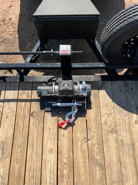A winch is attached to the back of a trailer