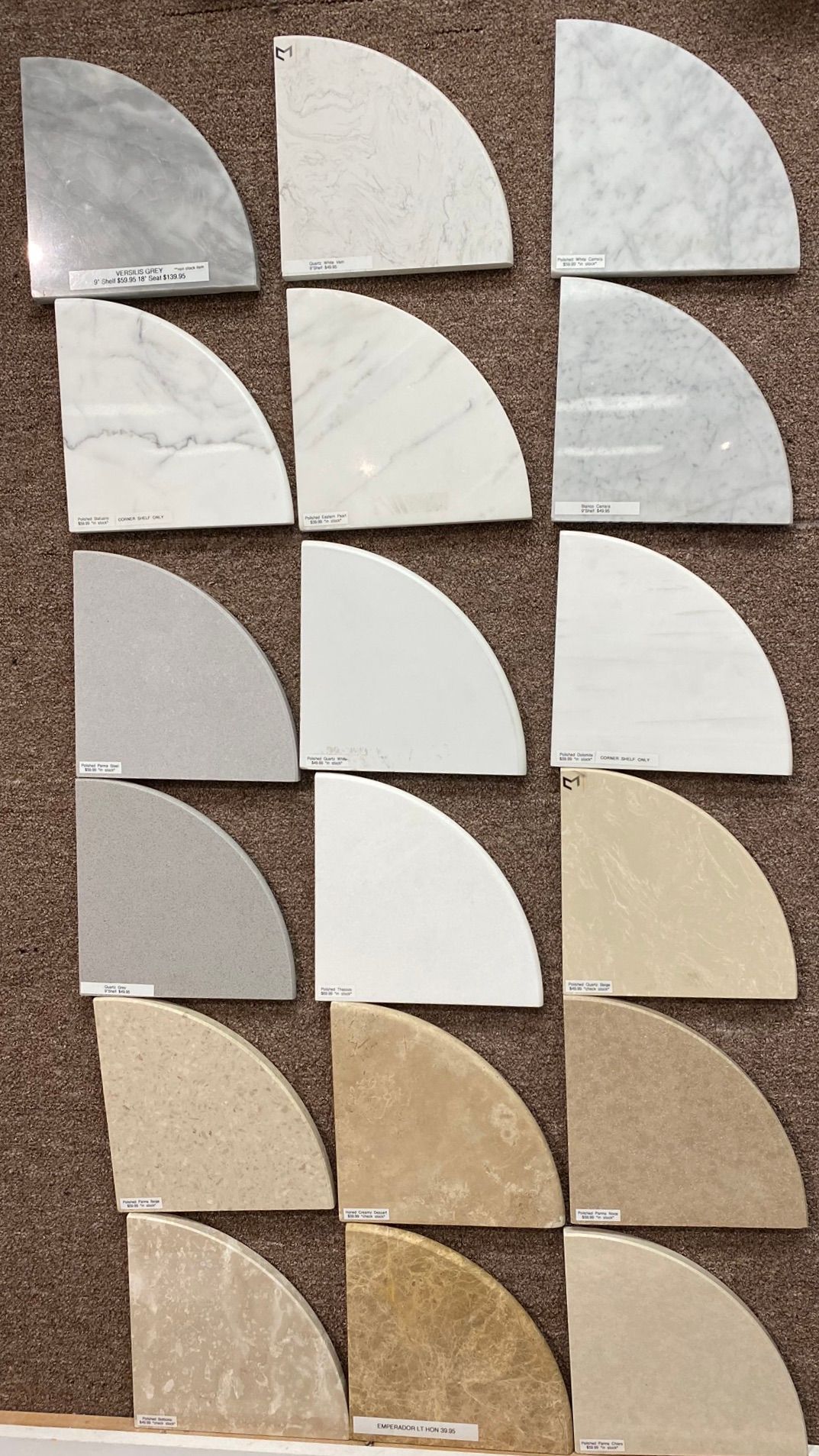 There are many different types of tiles on the wall.