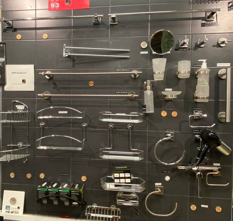 A wall with a lot of bathroom items on it