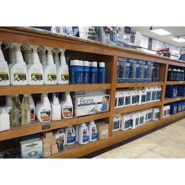 A shelf filled with lots of cleaning supplies in a store.