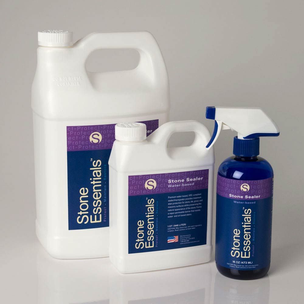 Three bottles of stone essentials sit next to each other