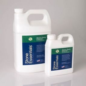Two bottles of stone essentials heavy duty cleaner