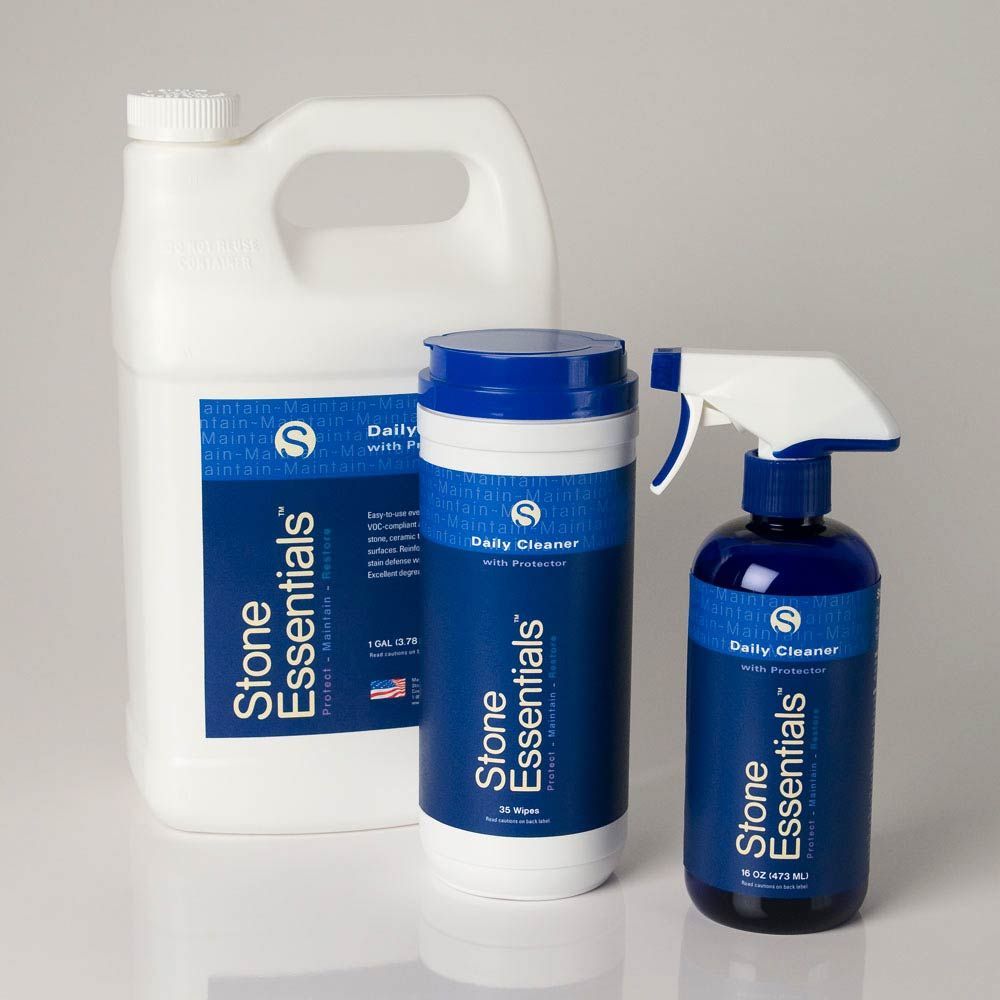 Three bottles of stone essentials sit next to each other