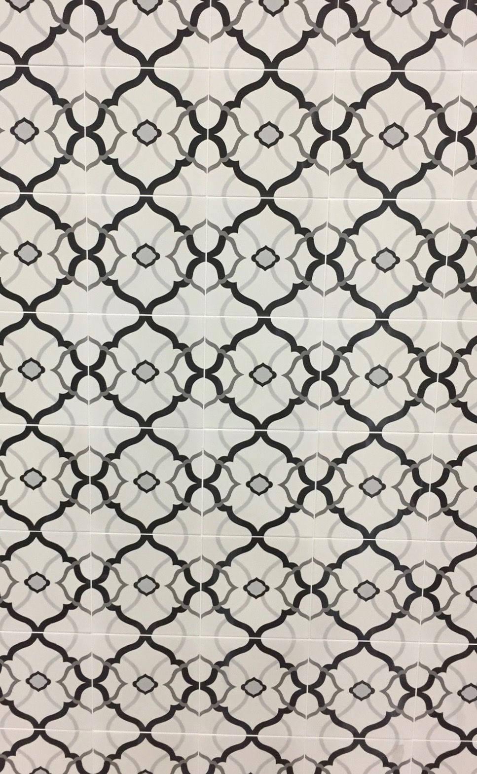 A black and white geometric pattern on a white background