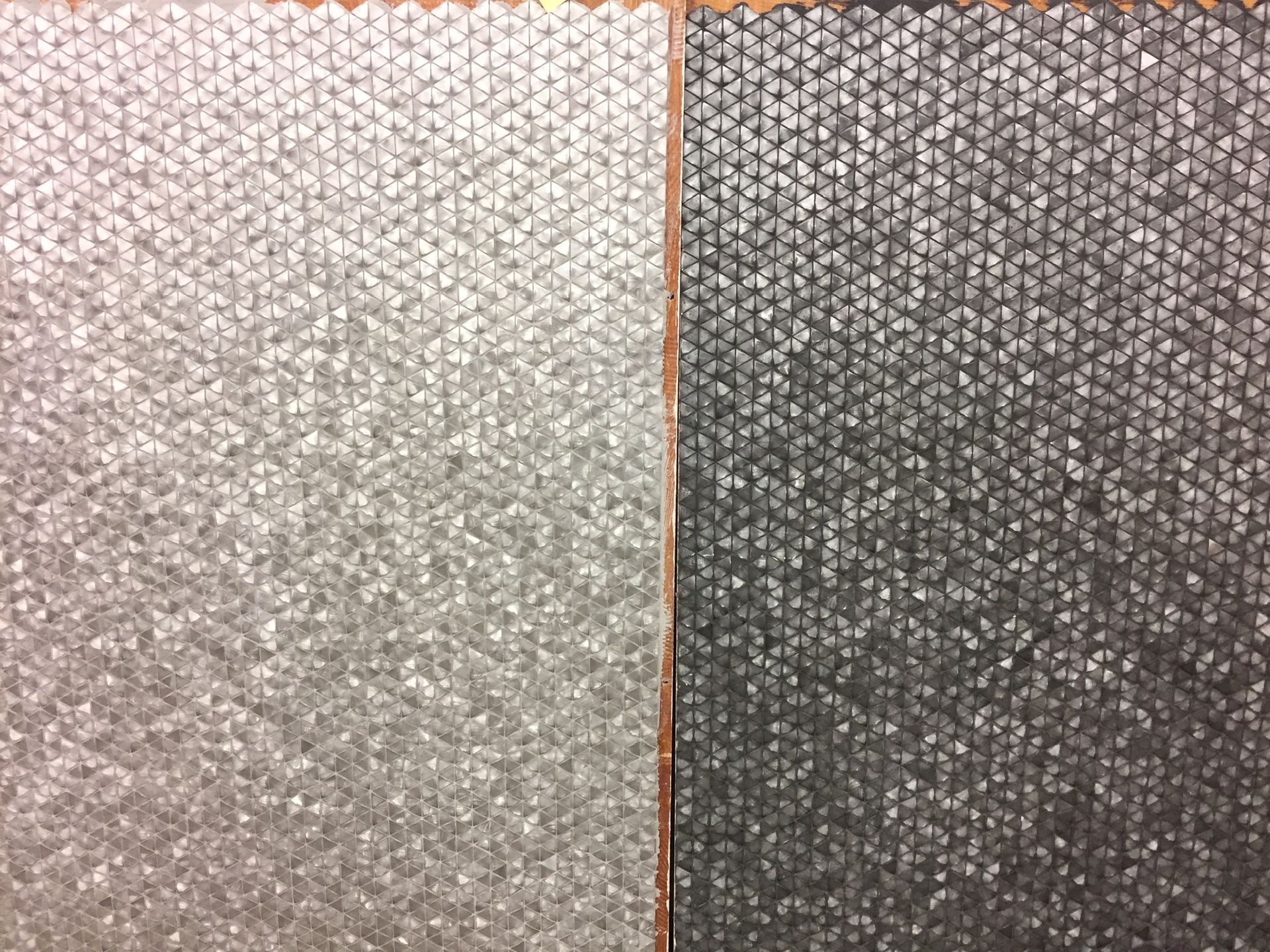 A close up of two pieces of paper with different patterns on them.