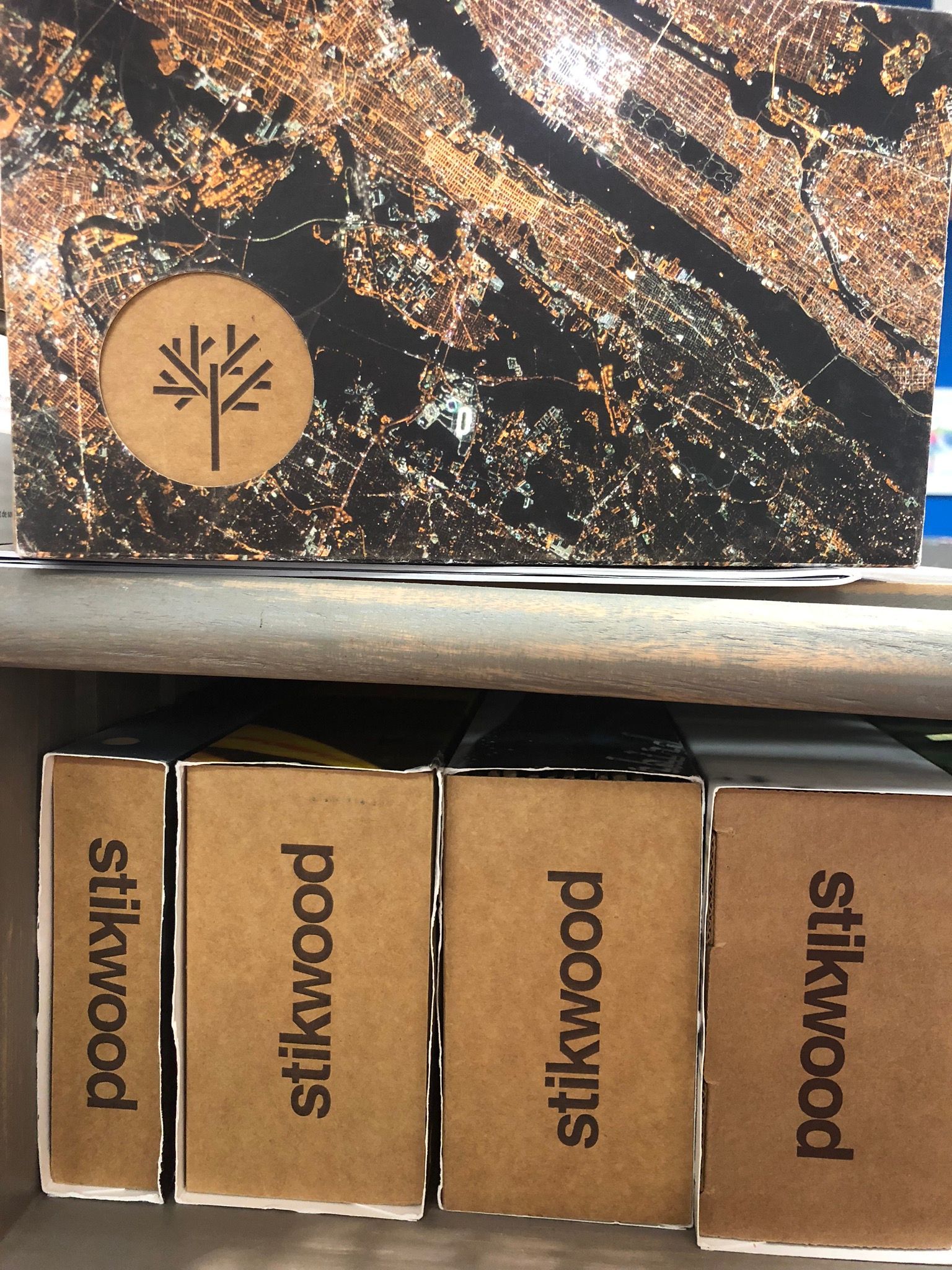 Three boxes of silkwood sit on a shelf