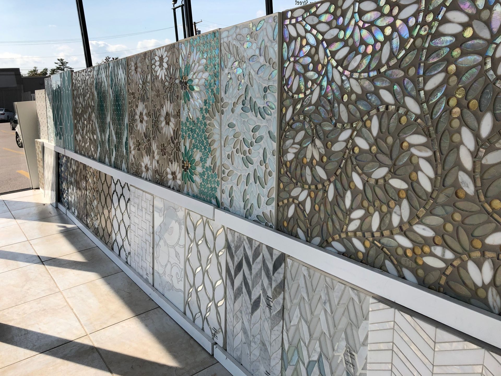 There are many different types of tiles on the wall.