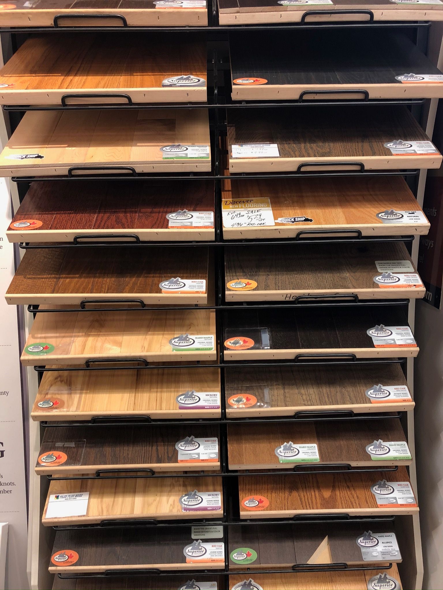 A display of different types of wooden flooring in a store