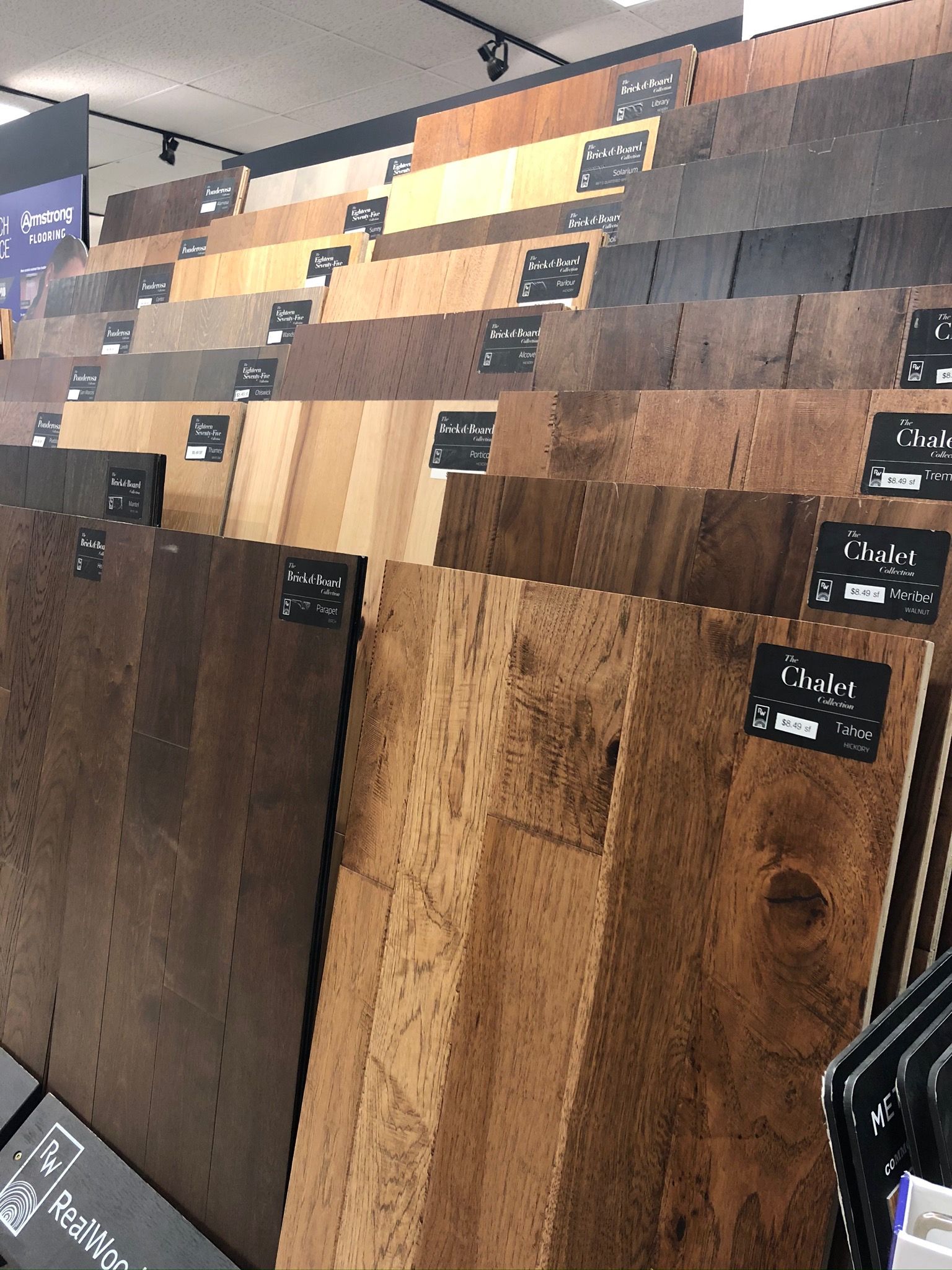 A bunch of wooden boards are stacked on top of each other