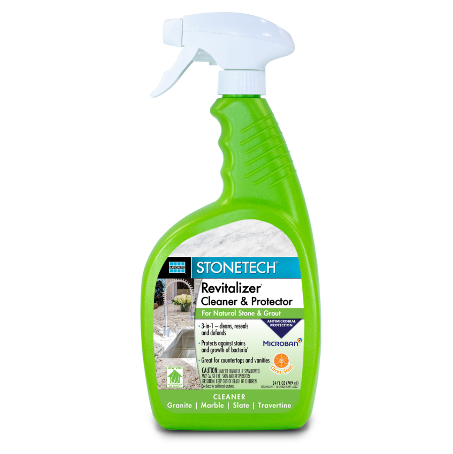 A green bottle of stonetech revitalizer cleaner and protector