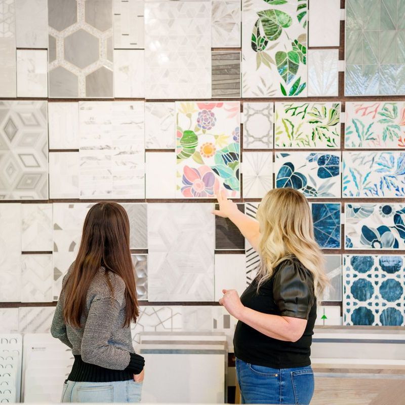 a white tile floor with a pattern of hexagonal tiles