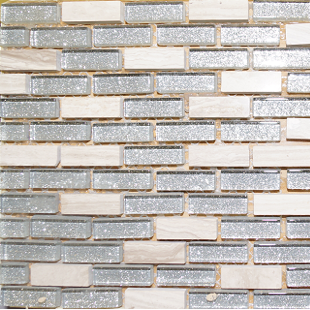 A close up of a brick wall with silver and white tiles