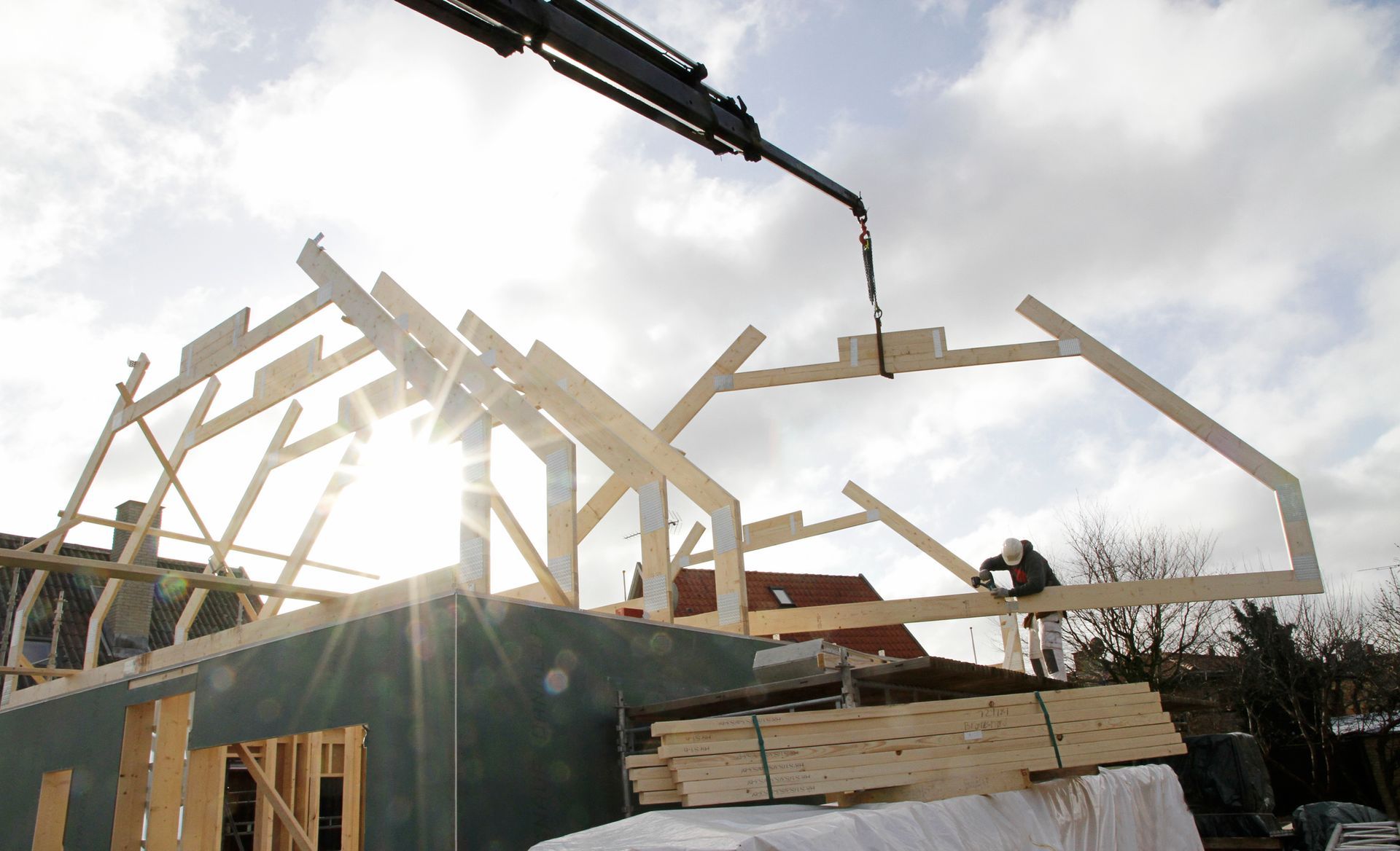 Builder at work on new structure.