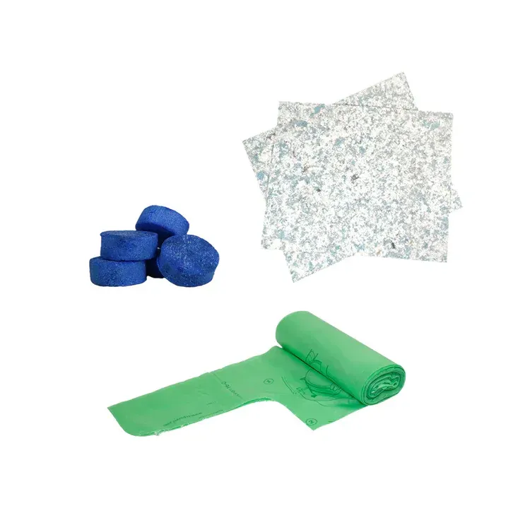 Three piles of cleaning supplies: blue scrubbing pads, patterned cleaning cloths, and a roll of green trash bags.