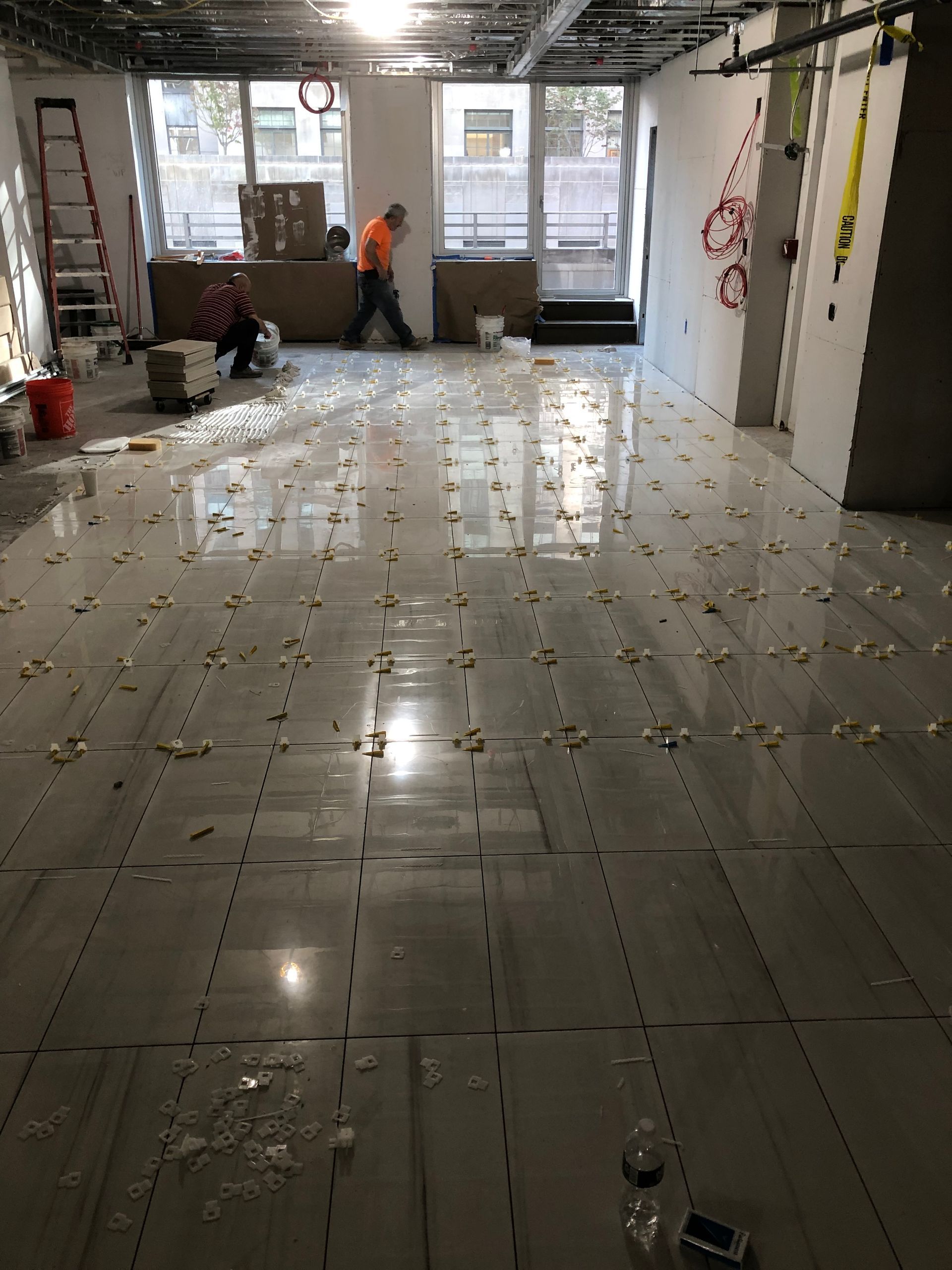 A large room with a lot of tiles on the floor