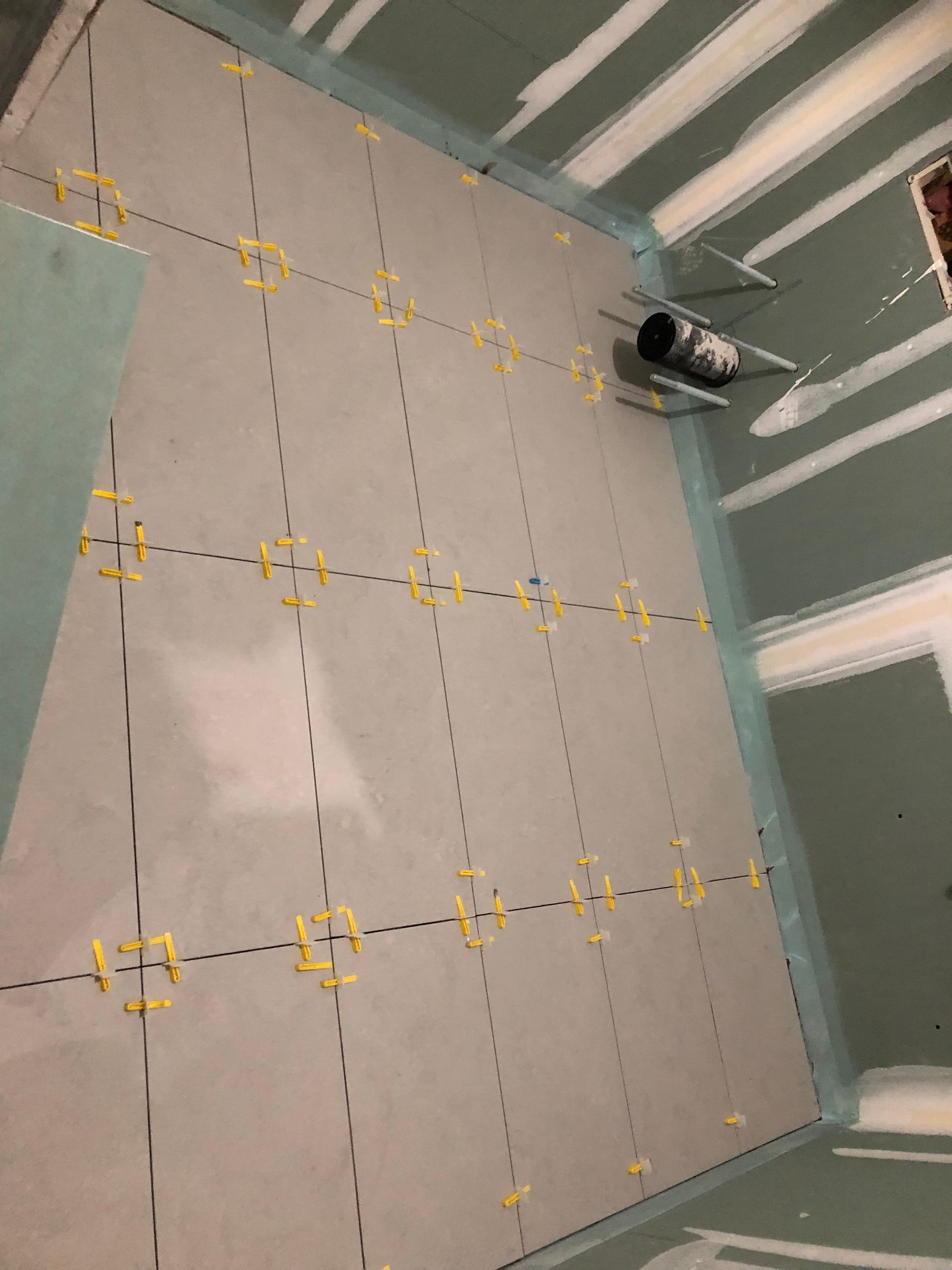 A room with a lot of tiles on the floor